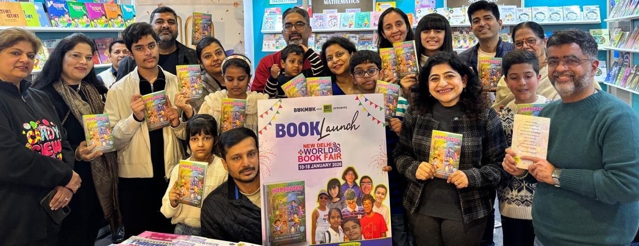 Young authors holding their anthology, Hopscotch, at its launch at the New Delhi World Book Fair